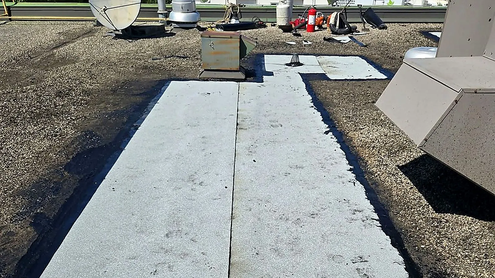 Commercial flat roof replacement project by Best Quality Roofing Works