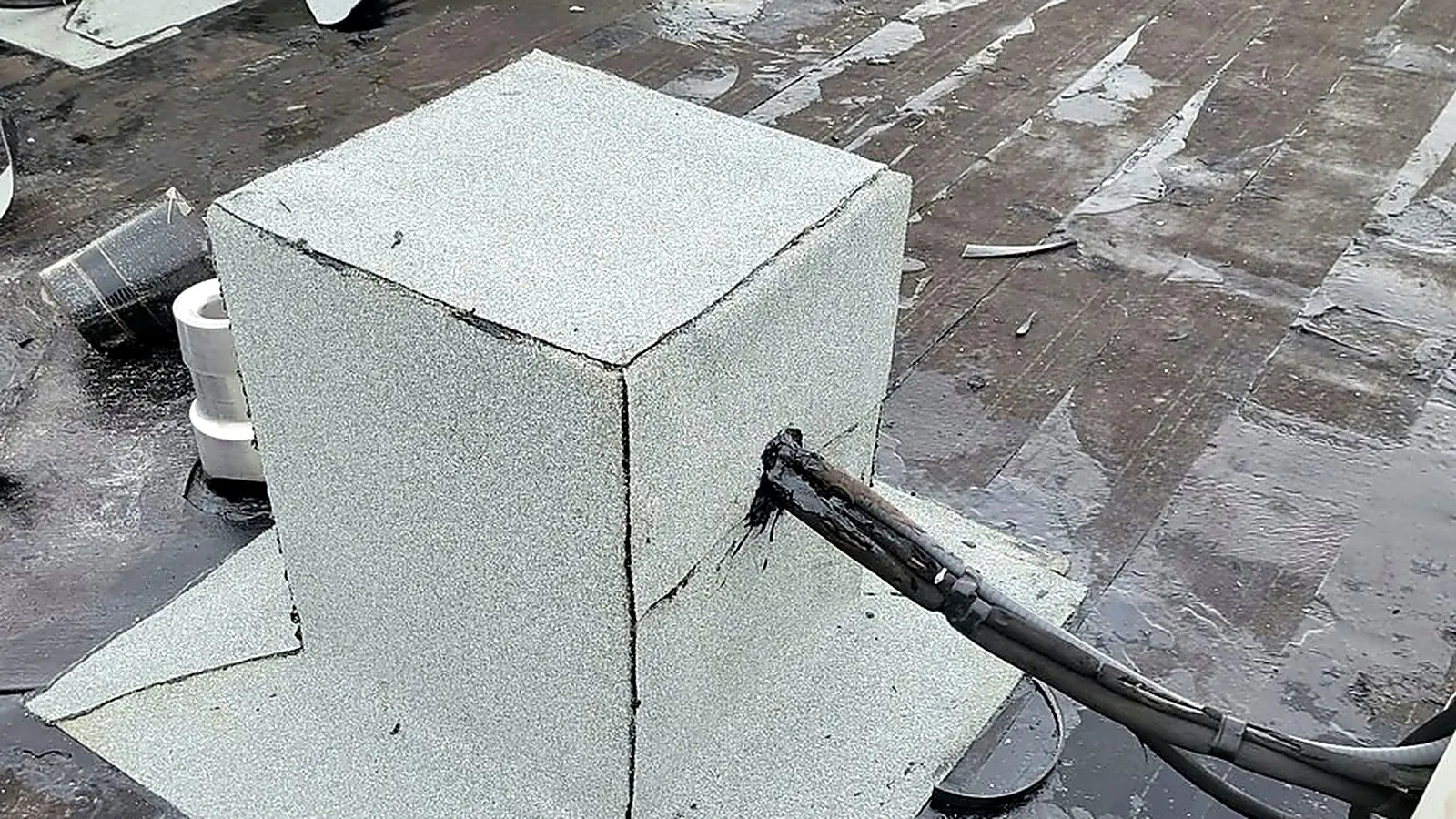 HVAC curb flashing detail on a commercial flat roof
