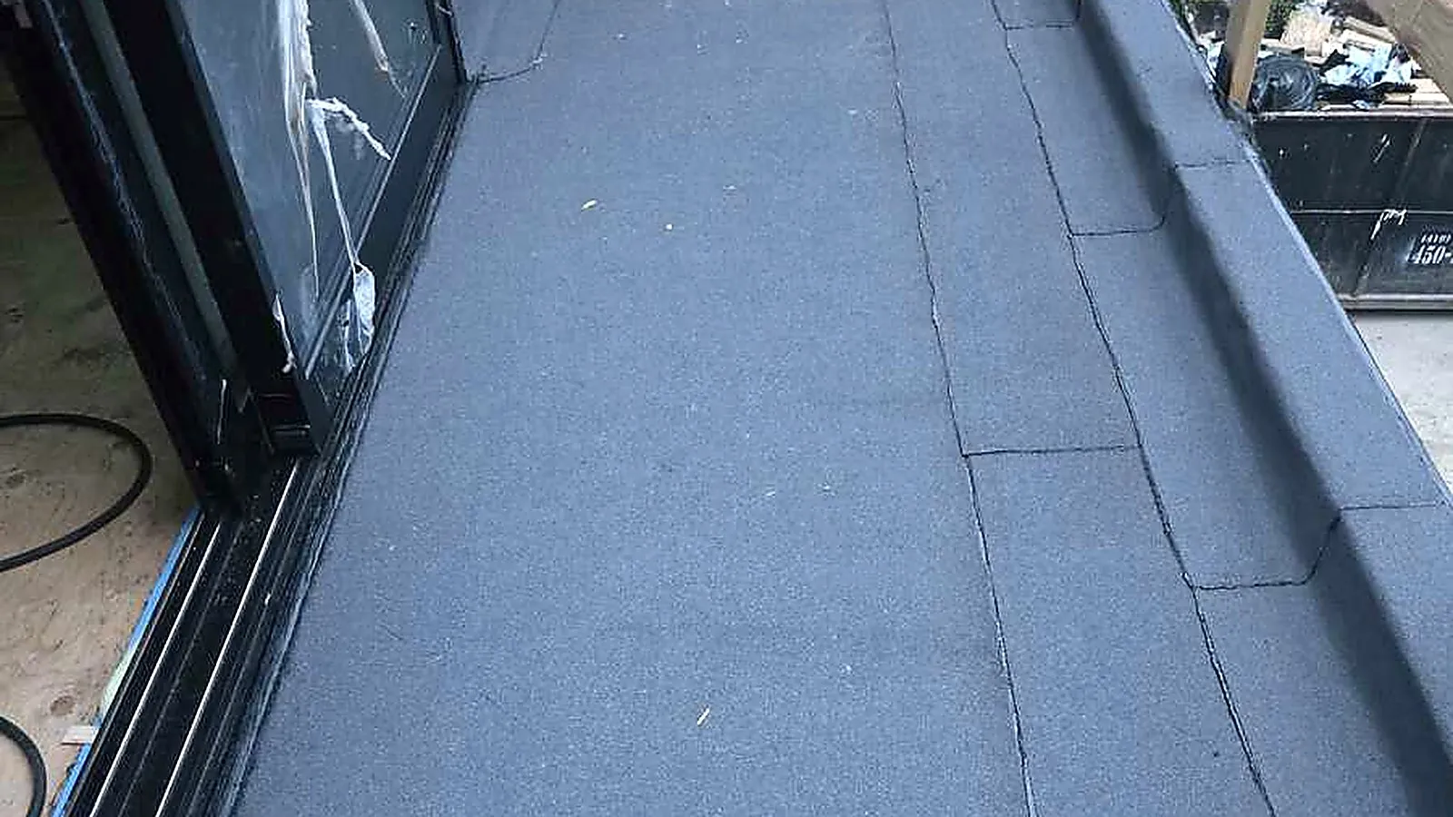 Rooftop deck waterproofing with a lake view