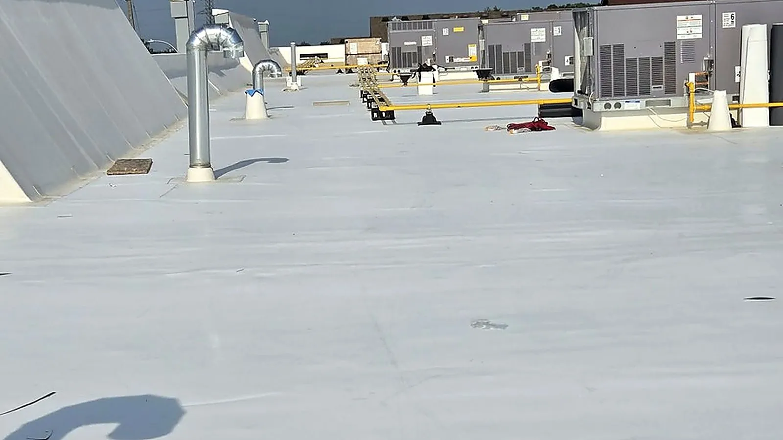 White membrane flat roof on a commercial building